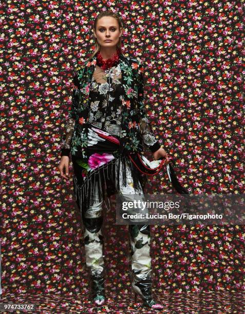 Model Inguna Butane poses at a fashion shoot for Madame Figaro on December 12, 2017 in Paris, France. Jacket , blouse , top , pants , scarf , boots ,...