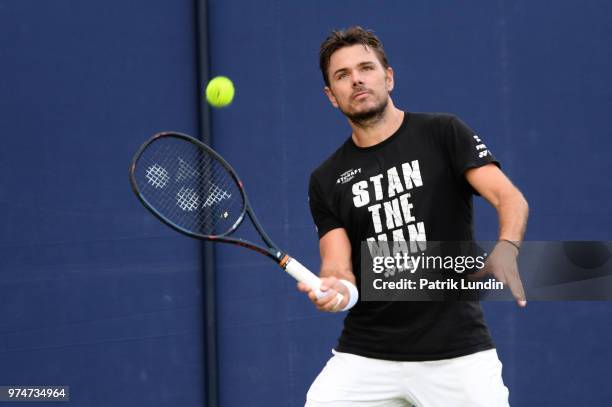 Stan Wawrinka of Switzerland hits a forehand in practice during preview Day 2 of the Fever-Tree Championships at Queens Club on June 14, 2018 in...