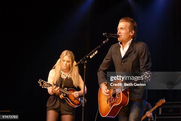 Cheyenne Kimball, Rachel Reinert, Tom Gossin and Mike Gossin of Gloriana performs in the New Faces of Country Music showcase during the 2010 Country...