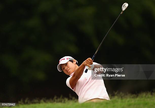 Yani Tseng of Taipei hits a iron shot on the 3rd hole during round three of the 2010 ANZ Ladies Masters at Royal Pines Resort on March 6, 2010 in...