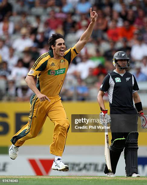 Mitchell Johnson of Australia celebrates his wicket of Brendon McCullum of New Zealand during the Second One Day International match between New...