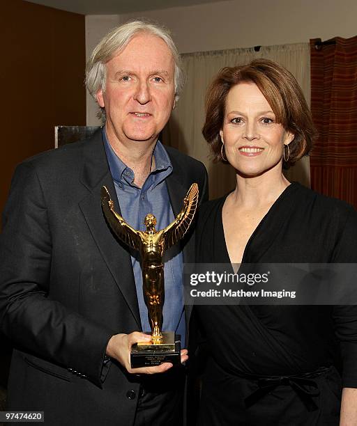 Director James Cameron, recipient of the Motion Picture Showman of the Year Award, and actress Sigourney Weaver attend the 47th Annual ICG Publicist...