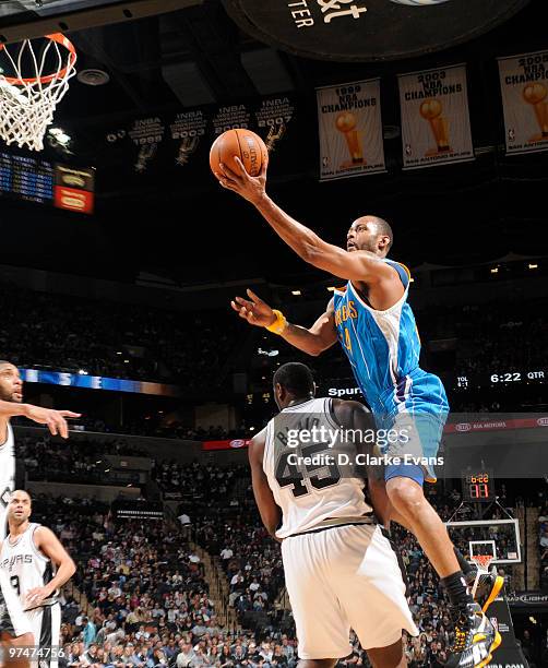 Aaron Gray of the New Orleans Hornets shoots against DeJuan Blair of the San Antonio Spurs on March 5, 2010 at the AT&T Center in San Antonio, Texas....