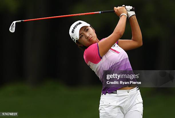 Bo-Mee Lee of Korea plays an approach shot on the 18th hole during round three of the 2010 ANZ Ladies Masters at Royal Pines Resort on March 6, 2010...