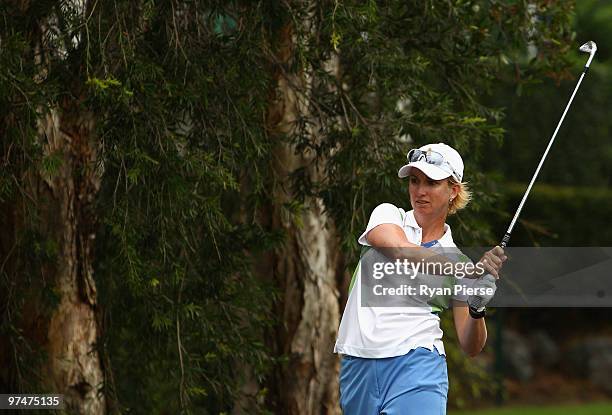 Karrie Webb of Australia plays out of the rough on the 4th hole during round three of the 2010 ANZ Ladies Masters at Royal Pines Resort on March 6,...