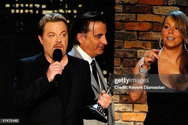 Host Eddie Izzard and presenters Andy Garcia and Mariah Carey onstage during the 25th Film Independent's Spirit Awards held at Nokia Event Deck at...
