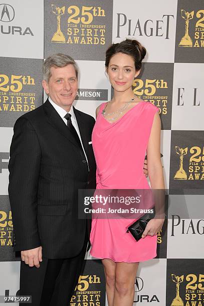 President of Piaget North America Larry Boland and actress Emmy Rossum wearing Piaget arrive at the 25th Film Independent Spirit Awards sponsored by...