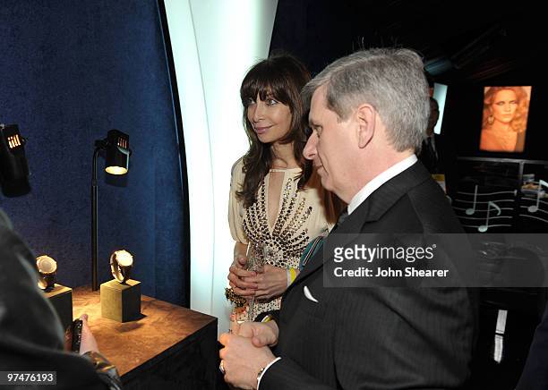 Actress Illeana Douglas and President of Piaget North America Larry Boland in the Piaget Lounge at the 25th Film Independent Spirit Awards held at...