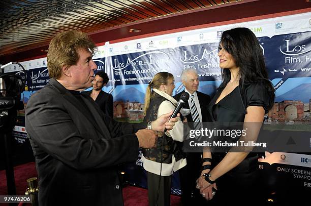 Actress Maria Grazia Cucinotta gets interviewed on the red carpet at the 5th Annual Los Angeles Italia Film, Fashion and Art Festival on March 5,...