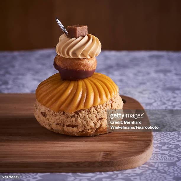 Caramel religieuse, by Christophe Michalak from Printemps du Gout, is photographed for Madame Figaro on December 13, 2017 in Paris, France. PUBLISHED...
