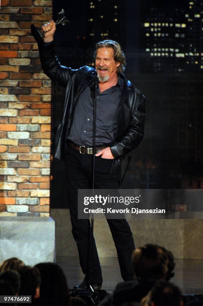 Actor Jeff Bridges accepts Best Male Lead award for "Crazy Heart" onstage during the 25th Film Independent's Spirit Awards held at Nokia Event Deck...