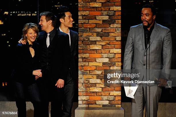 Director Lee Daniels accepts the Best Director award for "Precious" from presenetrs Jodie Foster and Jeremy Renner onstage during the 25th Film...