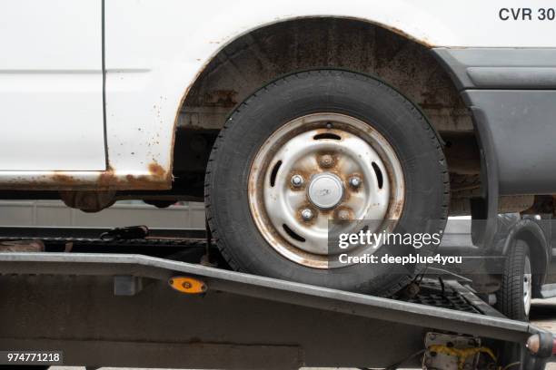 broken tire of an old white delivery van - rust   germany stock pictures, royalty-free photos & images