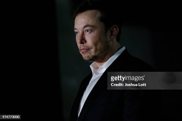 Engineer and tech entrepreneur Elon Musk of The Boring Company listens as Chicago Mayor Rahm Emanuel talks about constructing a high speed transit...
