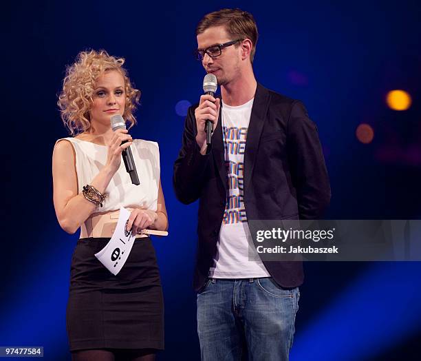 Hosts Mirjam Weichelbraun and Joko Winterscheidt act during the ''The Dome 53'' concert event at the Velodrom on March 5, 2010 in Berlin, Germany.