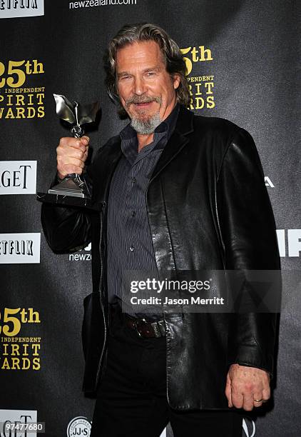 Actor Jeff Bridges, winner Best Male Lead for 'Crazy Heart,' poses in the press room at the 25th Film Independent's Spirit Awards held at Nokia Event...