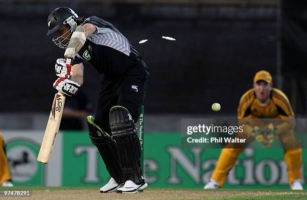 Shane Bond of New Zealand is bowled by Mitchell Johnson of Australia during the Second One Day International match between New Zealand and Australia...