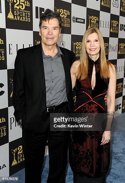 Producers Michael A. Simpson and Judy Cairo arrive at the 25th Film Independent's Spirit Awards held at Nokia Event Deck at L.A. Live on March 5,...