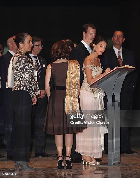 Prince Joachim and Princess Marie of Denmark sign the guest book at the Antropologic National Museum on March 5, 2010 in Mexico City, Mexico. The...
