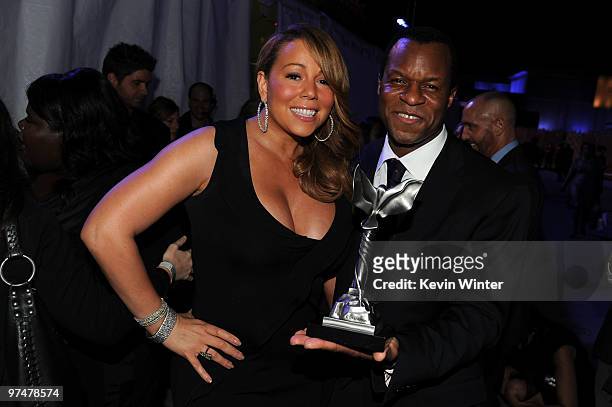 Singer/actress Mariah Carey and screenwriter Geoffrey Fletcher, winner Best First Screenplay for 'Precious,' backstage at the 25th Film Independent's...