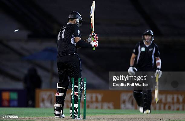 Daniel Vettori of New Zealand is bowled by Ryan Harris of Australia during the Second One Day International match between New Zealand and Australia...
