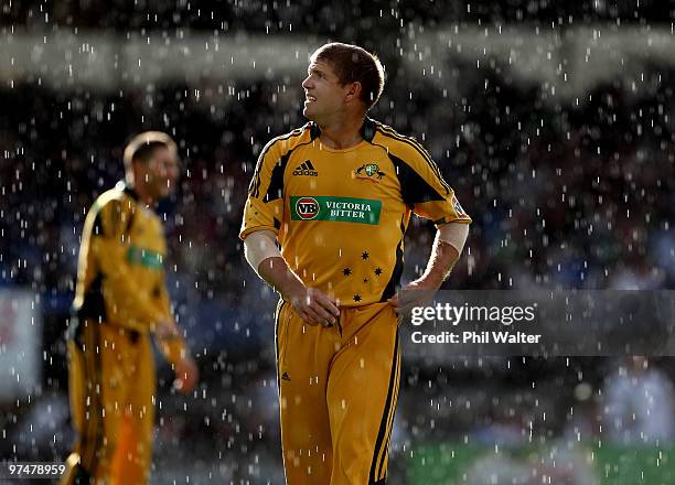 James Hopes of Australia looks up towards the rain clouds during the Second One Day International match between New Zealand and Australia at Eden...