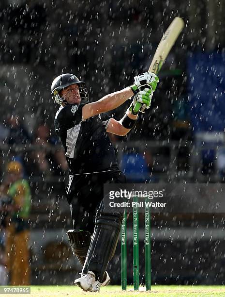 Scott Styris of New Zealand bats in the rain during the Second One Day International match between New Zealand and Australia at Eden Park on March 6,...