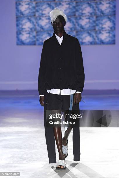 Model walks the runway at the Fumito Ganryu fashion show during the 94th Pitti Immagine Uomo on June 13, 2018 in Florence, Italy.