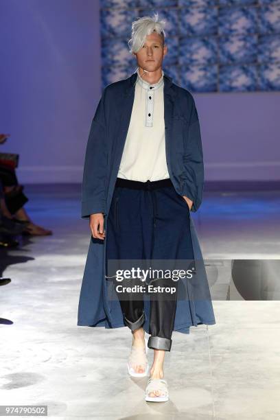 Model walks the runway at the Fumito Ganryu fashion show during the 94th Pitti Immagine Uomo on June 13, 2018 in Florence, Italy.