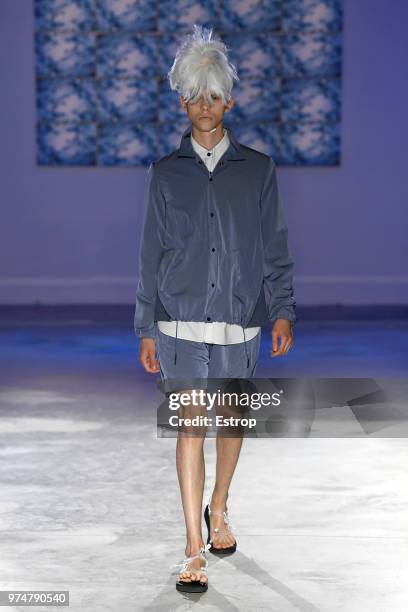 Model walks the runway at the Fumito Ganryu fashion show during the 94th Pitti Immagine Uomo on June 13, 2018 in Florence, Italy.