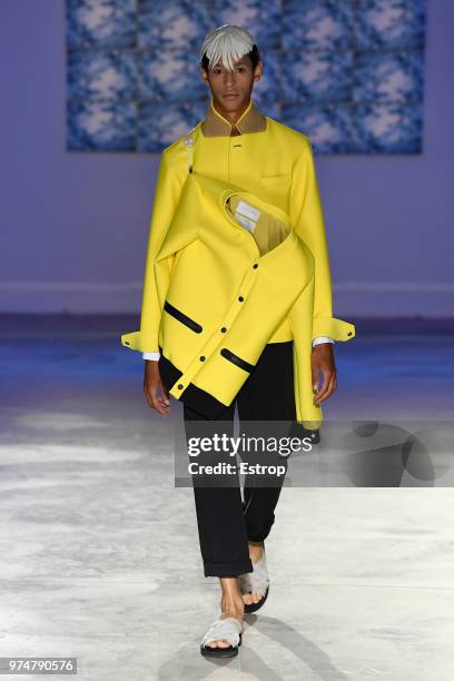 Model walks the runway at the Fumito Ganryu fashion show during the 94th Pitti Immagine Uomo on June 13, 2018 in Florence, Italy.