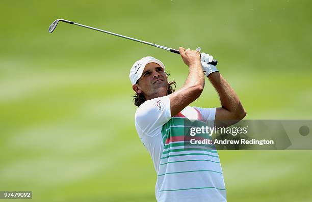 Johan Edfors of Sweden plays his second shot on the seventh hole during the the third round of the Maybank Malaysian Open at the Kuala Lumpur Golf...