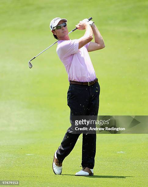 Brett Rumford of Australia plays his second shot on the seventh hole during the the third round of the Maybank Malaysian Open at the Kuala Lumpur...