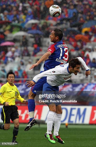 Sota Hirayama of FC Tokyo and Shohei Ogura of Yokohama F. Marinos compete for the ball during the J.League match between FC Tokyo and Yokohama F....