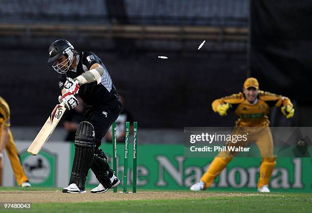 Shane Bond of New Zealand is bowled by Mitchell Johnson of Australia during the Second One Day International match between New Zealand and Australia...