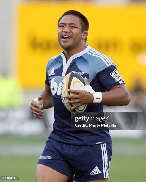 Kevin Mealamu captain of the Blues runs out onto the field during the round four Super 14 match between the Crusaders and the Blues at AMI Stadium on...