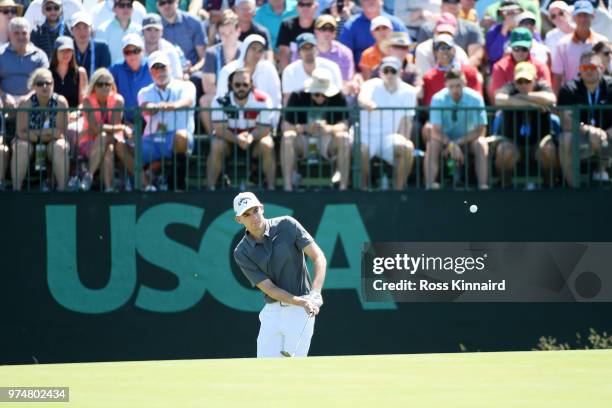 Aaron Wise of the United States plays his second shot on the seventh green during the first round of the 2018 U.S. Open at Shinnecock Hills Golf Club...