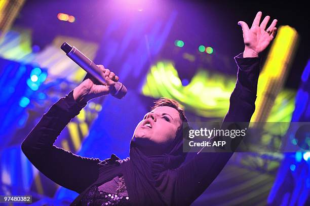 Irish singer Dolores O'Riordan of Irish rock band "The Cranberries" performs on stage in Nantes, western France, on March 5, 2010. AFP PHOTO / FRANK...