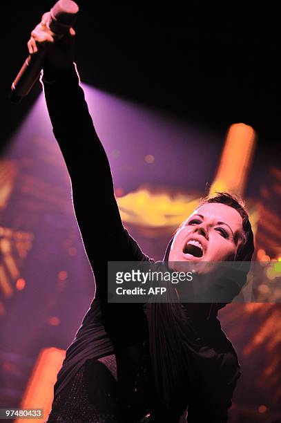 Irish singer Dolores O'Riordan of Irish rock band "The Cranberries" performs on stage in Nantes, western France, on March 5, 2010. AFP PHOTO / FRANK...