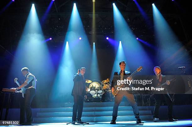 Gary Kemp, Tony Hadley, Martin Kemp and Steve Norman perform on stage at Zenith on March 5, 2010 in Munich, Germany.