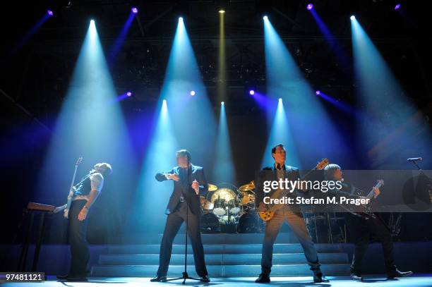 Gary Kemp, Tony Hadley, Martin Kemp and Steve Norman perform on stage at Zenith on March 5, 2010 in Munich, Germany.