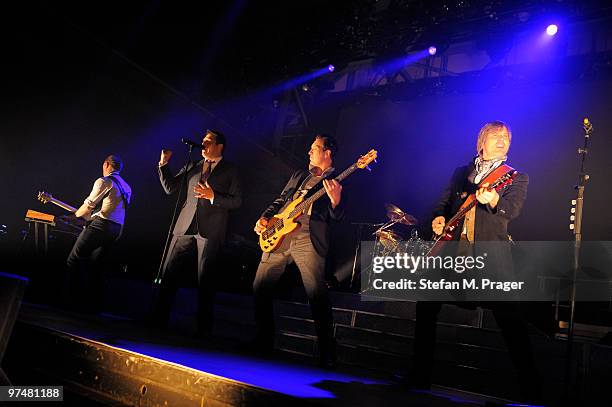 Gary Kemp, Tony Hadley, Martin Kemp and Steve Norman perform on stage at Zenith on March 5, 2010 in Munich, Germany.