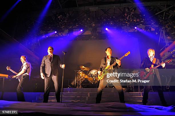 Gary Kemp, Tony Hadley, Martin Kemp and Steve Norman perform on stage at Zenith on March 5, 2010 in Munich, Germany.