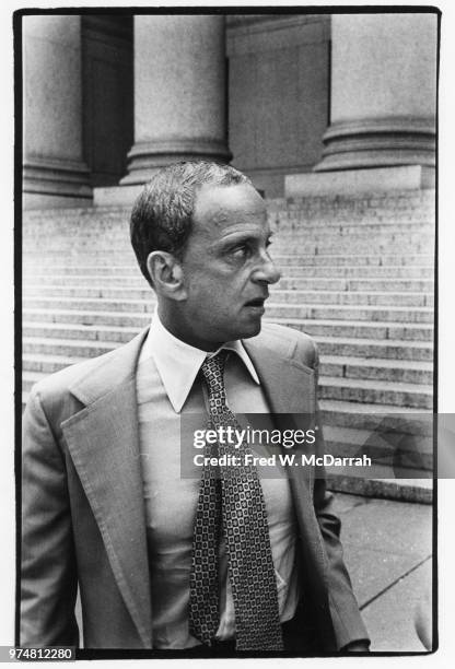 View of American attorney Roy Cohn as he stands near the steps of the New York County Courthouse , New York, New York, July 21, 1977.