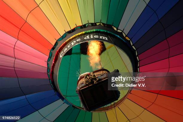 low angle view of hot air balloon - heißluftballon stock-fotos und bilder
