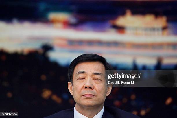 Chongqing Municipality Communist Party Secretary Bo Xilai attends a meeting during the annual National People's Congress at the Great Hall of the...