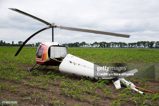 June 2018, Berne, Germany: A helicopter, type Enstrom F-28F has performed an emergency landing over a corn field after the motor malfunctioned. Both...