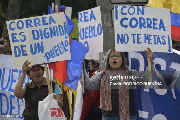 Supporters of former Ecuadoran president Rafael Correa demonstrate outside the National Assembly in Quito after the prosecutor's office earlier this...