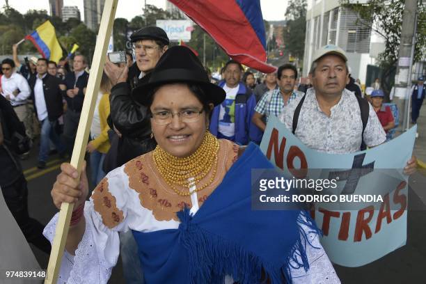 Supporters of former Ecuadoran president Rafael Correa march to the National Assembly in Quito to demonstrate after the prosecutor's office earlier...