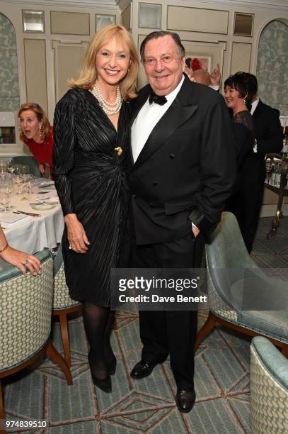 Lizzie Spender and Barry Humphries attend the Highclere Thoroughbred Racing Royal Ascot dinner at Fortnum & Mason on June 14, 2018 in London, England.